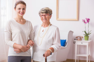 caregiver and patient smiling